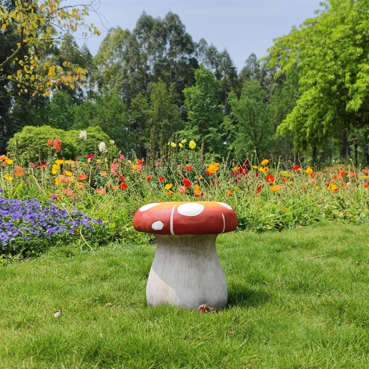 Resin statue 20.8 feet tall. indoor and outdoor dining table. large-sized sculpture. garden lawn. pool decoration. exterior courtyard of buildings. round dining table. chair decoration. red mushrooms