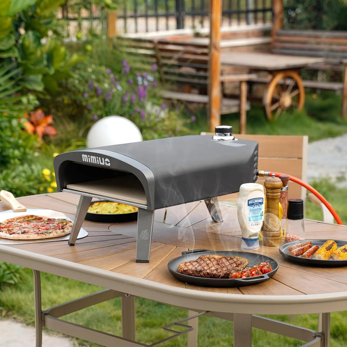 Outdoor gas pizza oven. portable propane pizza grill. equipped with an automatic rotation system and pizza stone
