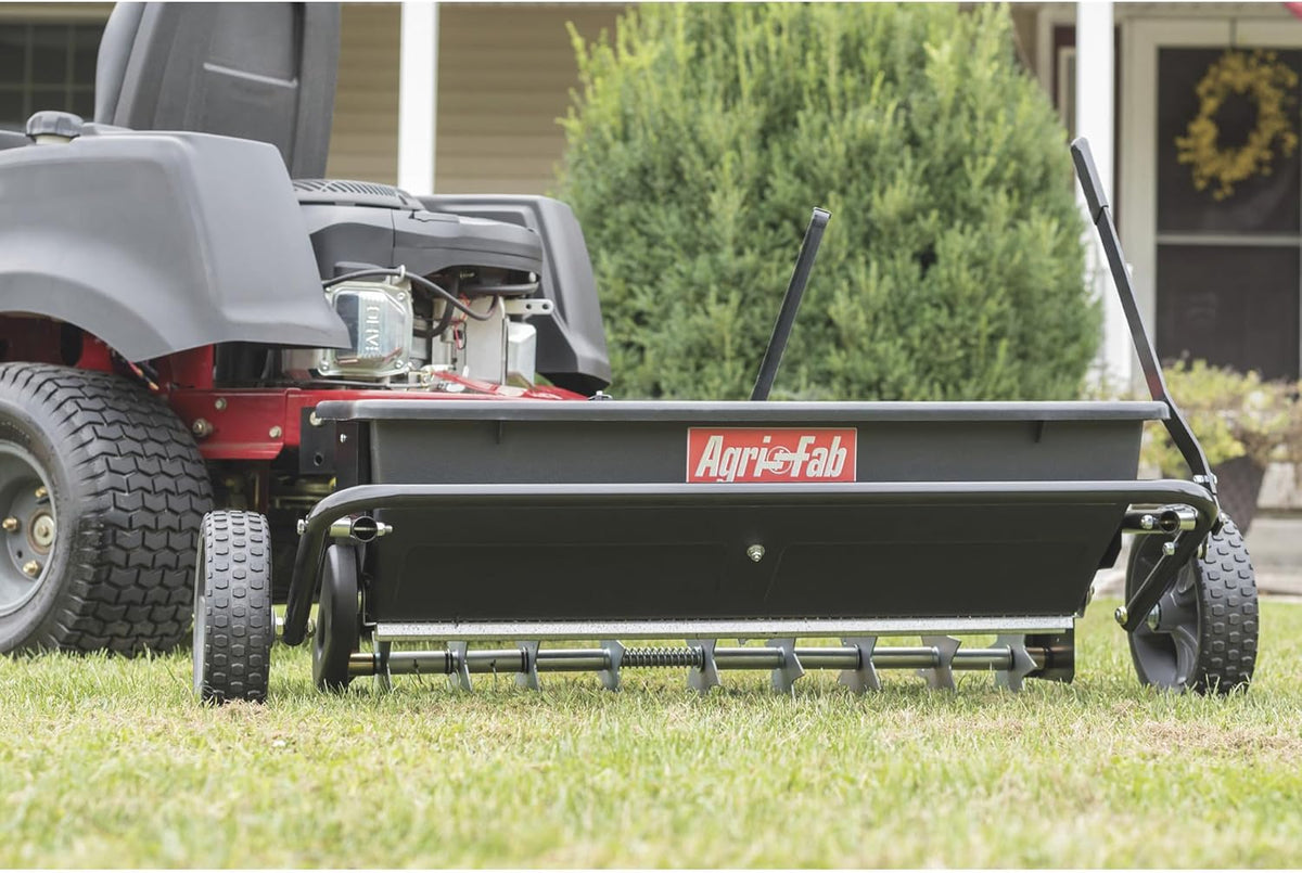 100-pound traction type seeder/seeder/sprayer. black version
