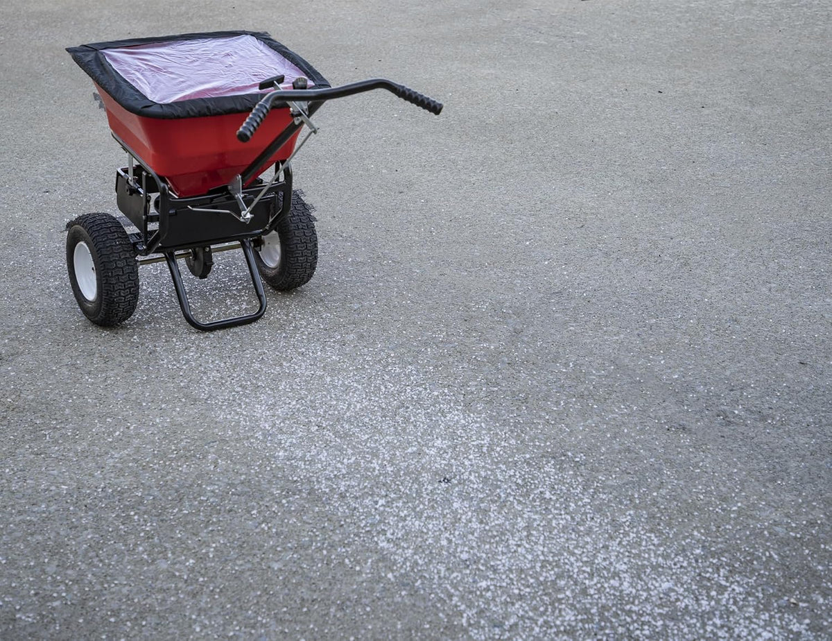100-Lb. Walk-Behind Push Spreader for Grass Seed. Salt. De-Icer and Fertilizer