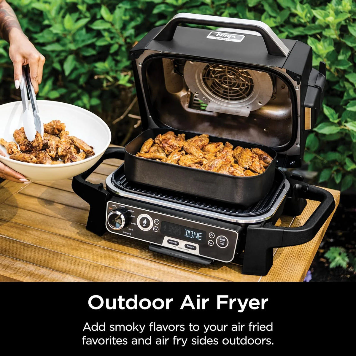 The wood-fire professional outdoor grill is equipped with an internal thermometer. It is a 7-in-one multi-functional grill. a barbecue smoker. an outdoor air fryer. featuring baking. roasting. dehydrating and grilling functions. It adopts the wood-fi