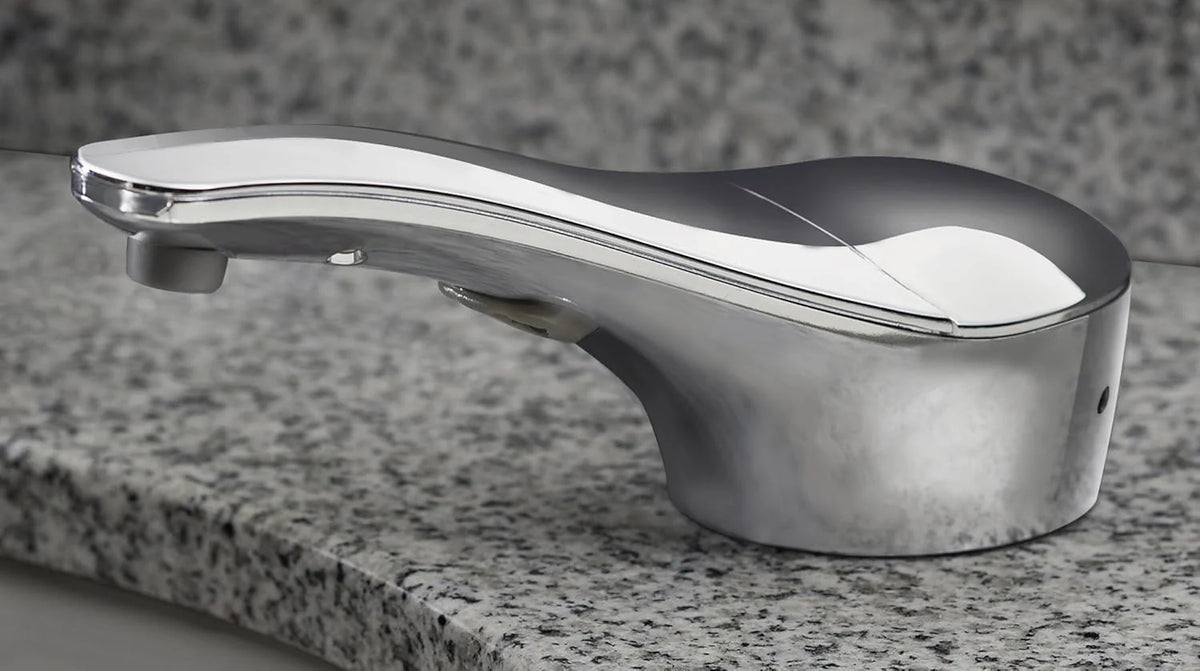 Automatic liquid soap dispenser. with a top-mounted contactless soap nozzle. capacity 34 ounces (1.0 liters). can be placed on the countertop of a public restroom. installation diameter 1-3/8 inches. chrome surface treatment.