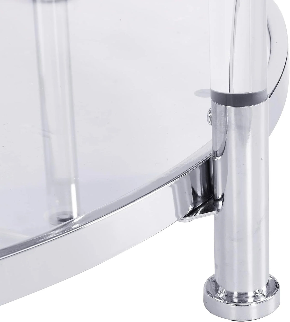 A round coffee table with a metal frame. the surface is made of chrome-plated acrylic glass.
