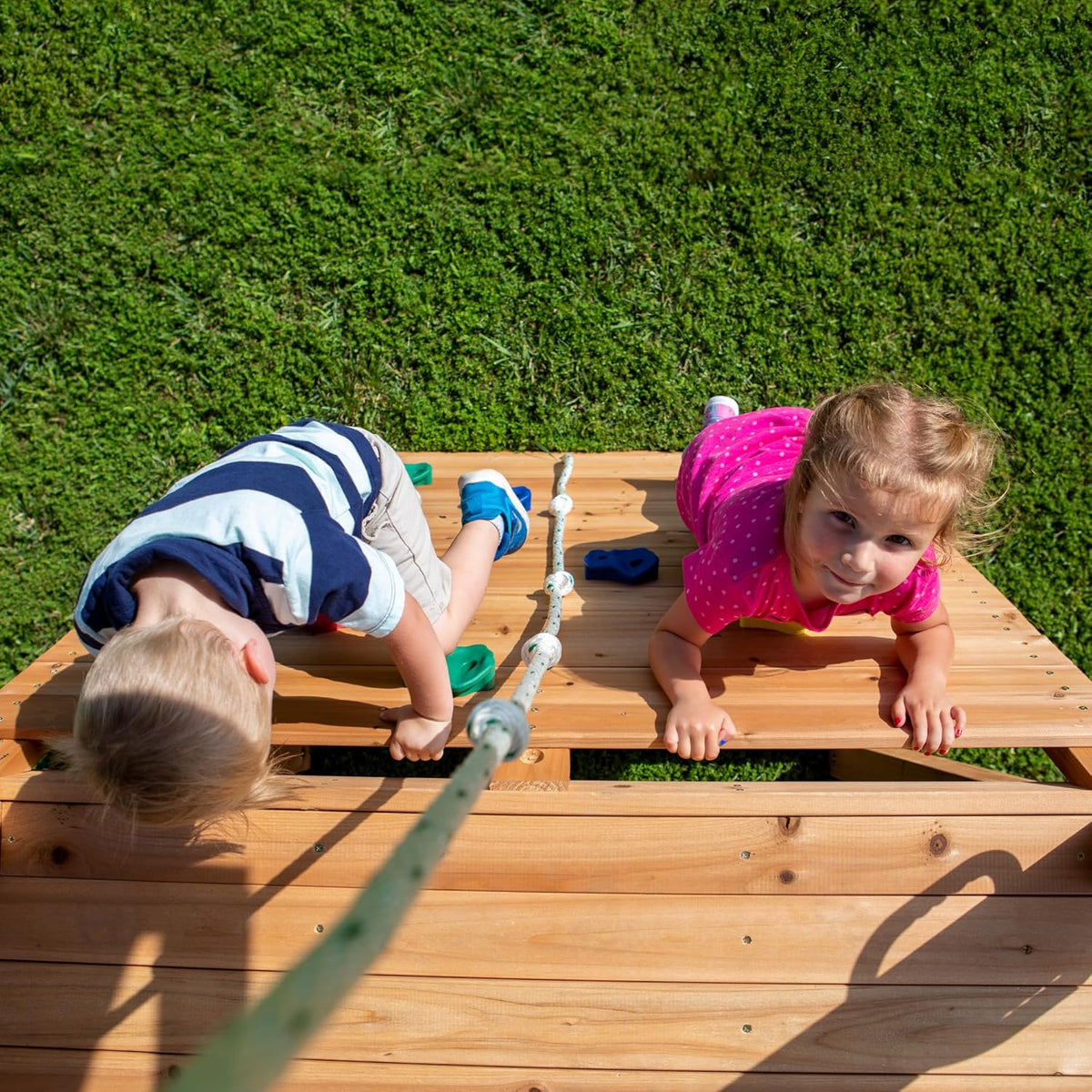 Cedar Wood Swing Set with Wave Slide. Play Deck. Double Rock Wall. Rope Ladder. Web Swing. Belt Swings. Toy Telescope. Steering Wheel. Sandbox Area. Outdoor Playset