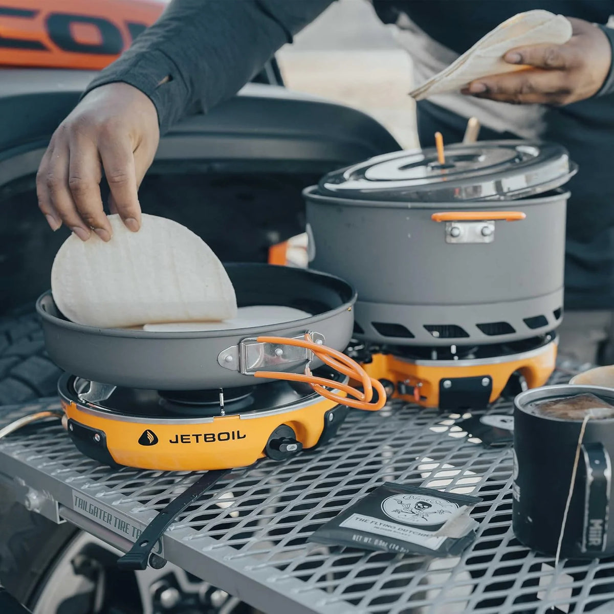 Backpack camping cooking equipment system. including camping cookware. suitable for backpacking and camping use.