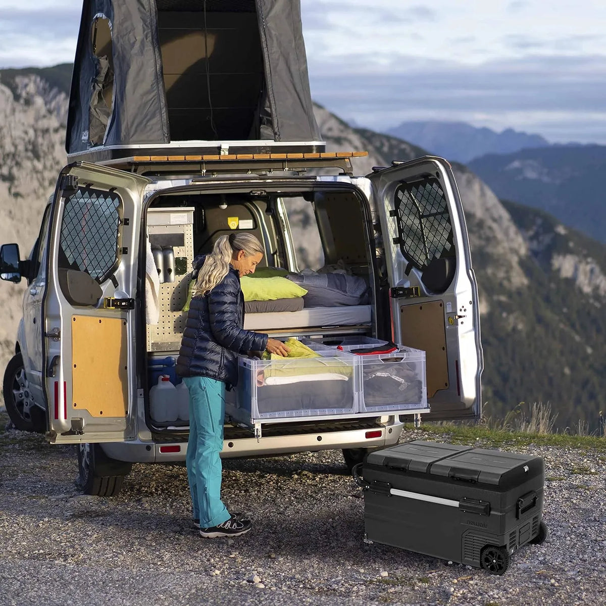 48 Qt. Portable 12v Electric Cooler with LG Compressor. Fridge and Freezer. Rugged Wheels. and Solar Power Input. Perfect Plug-In Cooler for Camping. Trucks. Travel. Car and Home