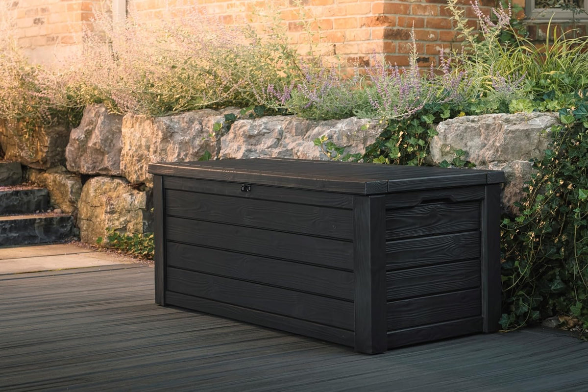 Outdoor storage deck box. 150-gallon resin deck storage box and bench. with wood-grain design. in brown color scheme