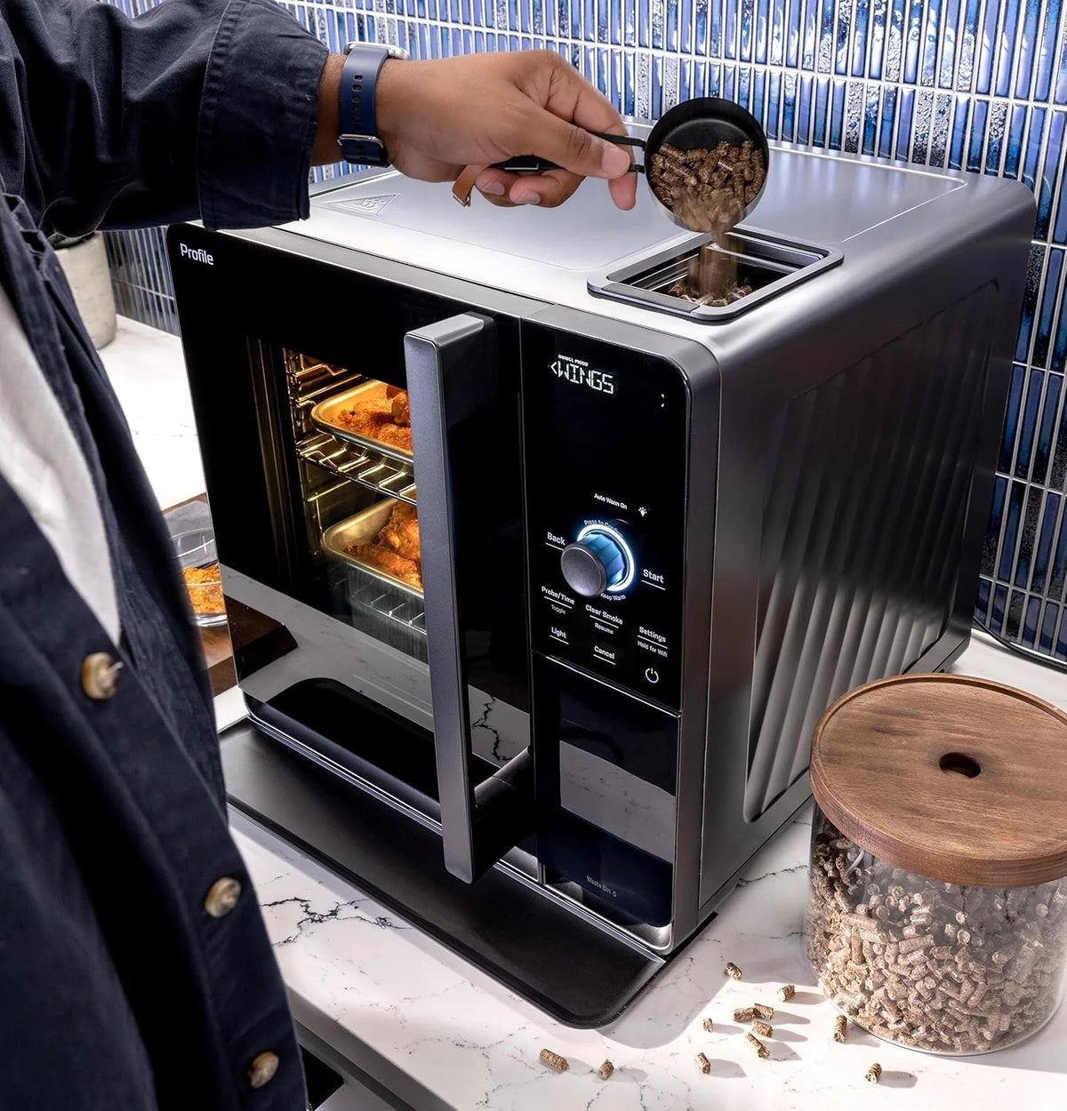 Smart Indoor Pellet Smoker. with Active Smoke Filtration. 5 Smoke Control Settings. WiFi Connected. Electric. Countertop BBQ Appliance. Black