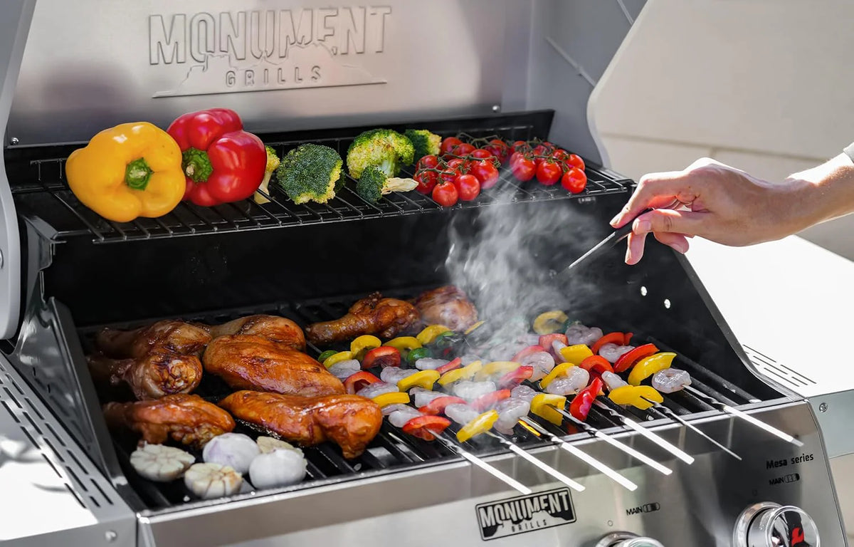 Grills 4-Burner Liquid Propane Gas Grill. Silver Stainless Steel Grill Outdoor Patio Garden Barbecue Grill with Clearview® Lid and One Foldable Shelf. Mesa400MF