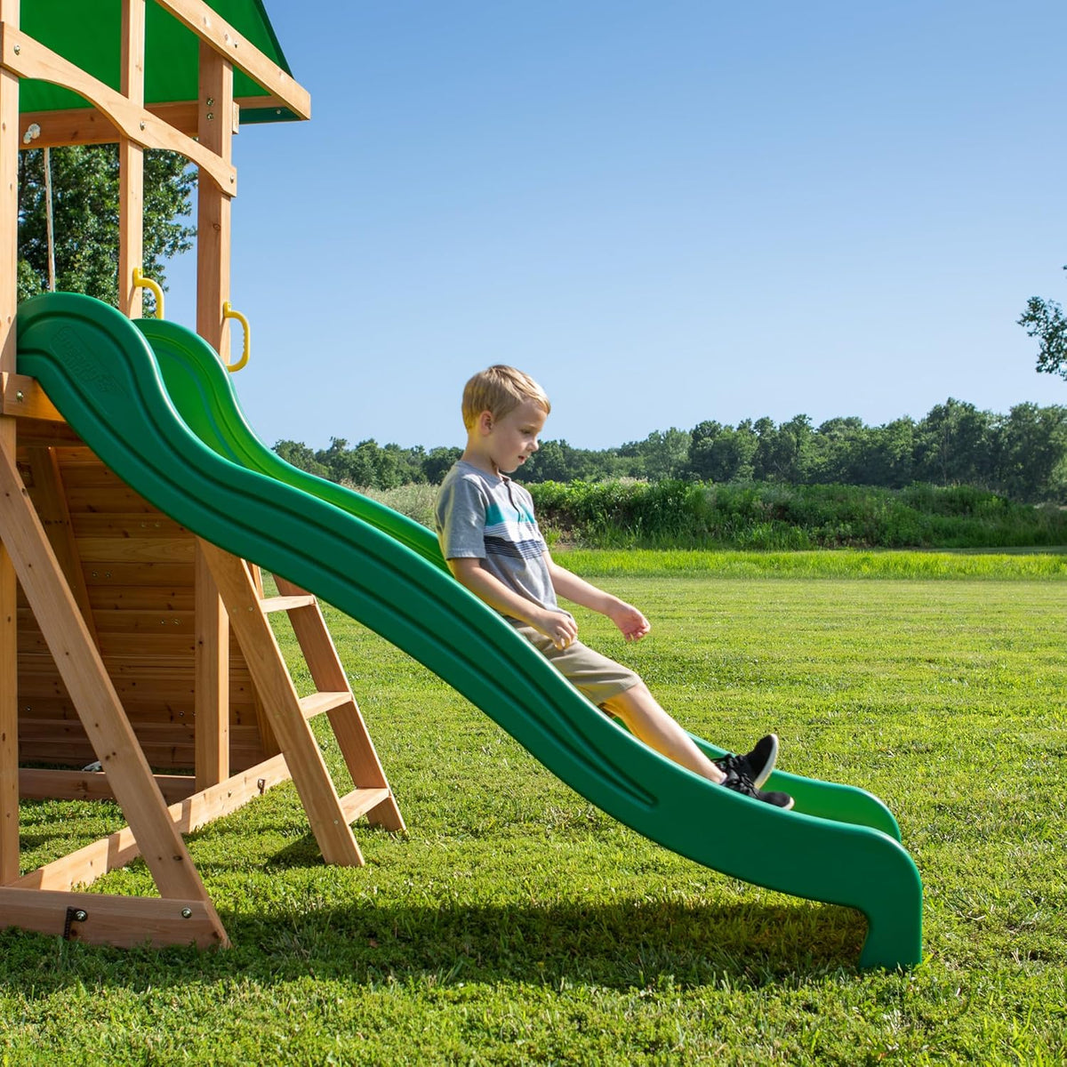 Mount Mckinley Cedar Wood Swing Set with Wave Slide. Play Deck. Double Rock Wall. Rope Ladder. Web Swing. Belt Swings. Toy Telescope. Steering Wheel. Sandbox Area. Outdoor Playset