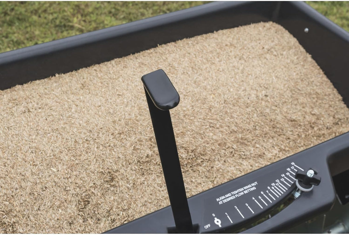 100-pound traction type seeder/seeder/sprayer. black version