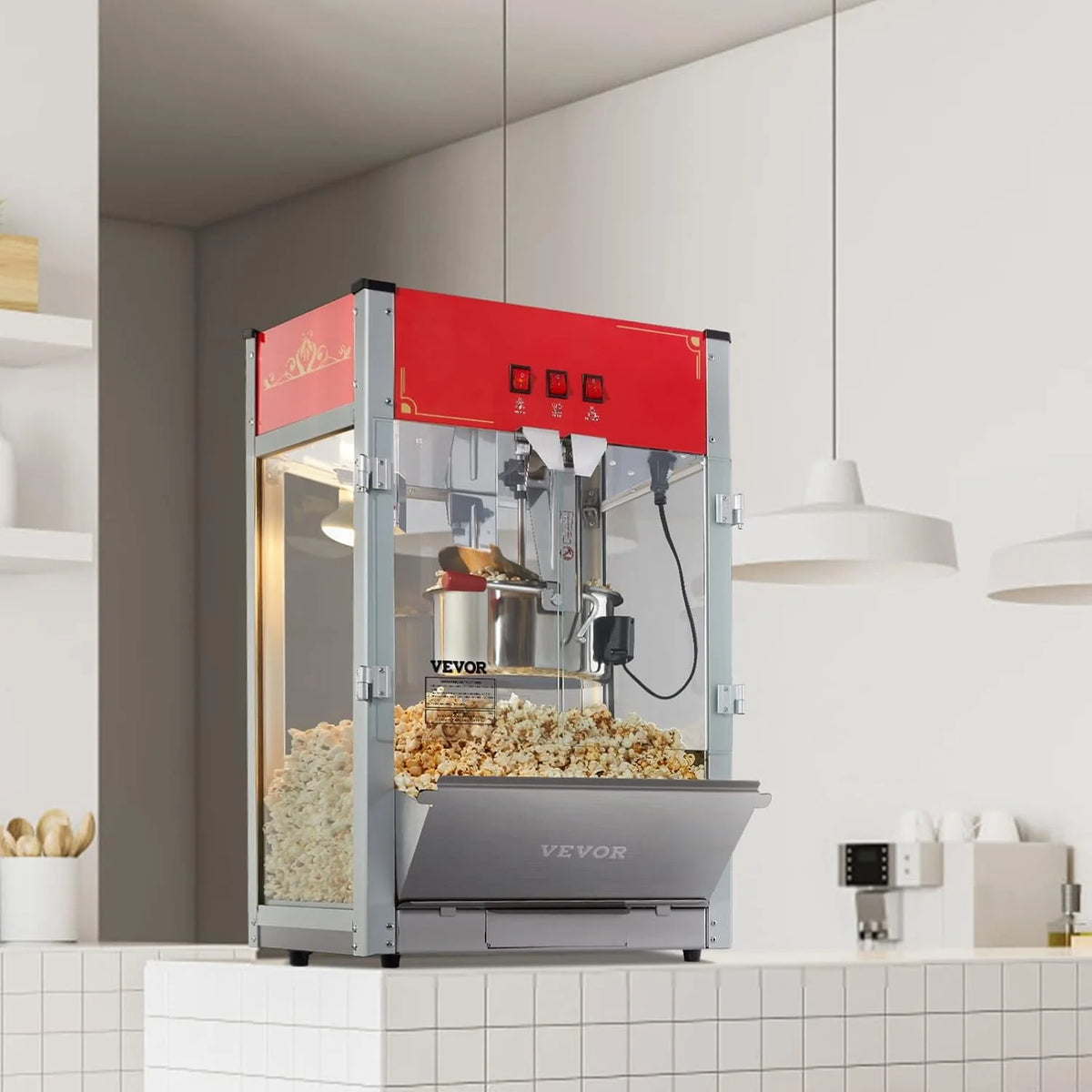 Popcorn machine. 12-ounce pot capacity. 1440-watt countertop popcorn machine. can produce 80 cups per batch. cinema-style popcorn machine. equipped with 3 switches for control. steel frame. tempered glass door. 1 pot. 2 spoons. red version