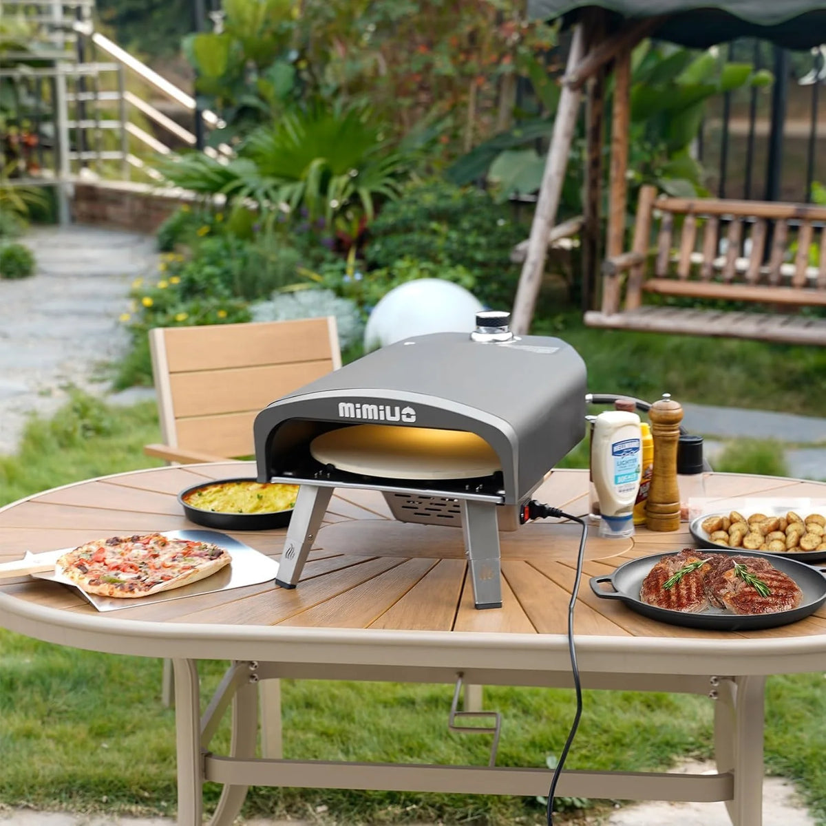 Outdoor gas pizza oven. portable propane pizza grill. equipped with an automatic rotation system and pizza stone