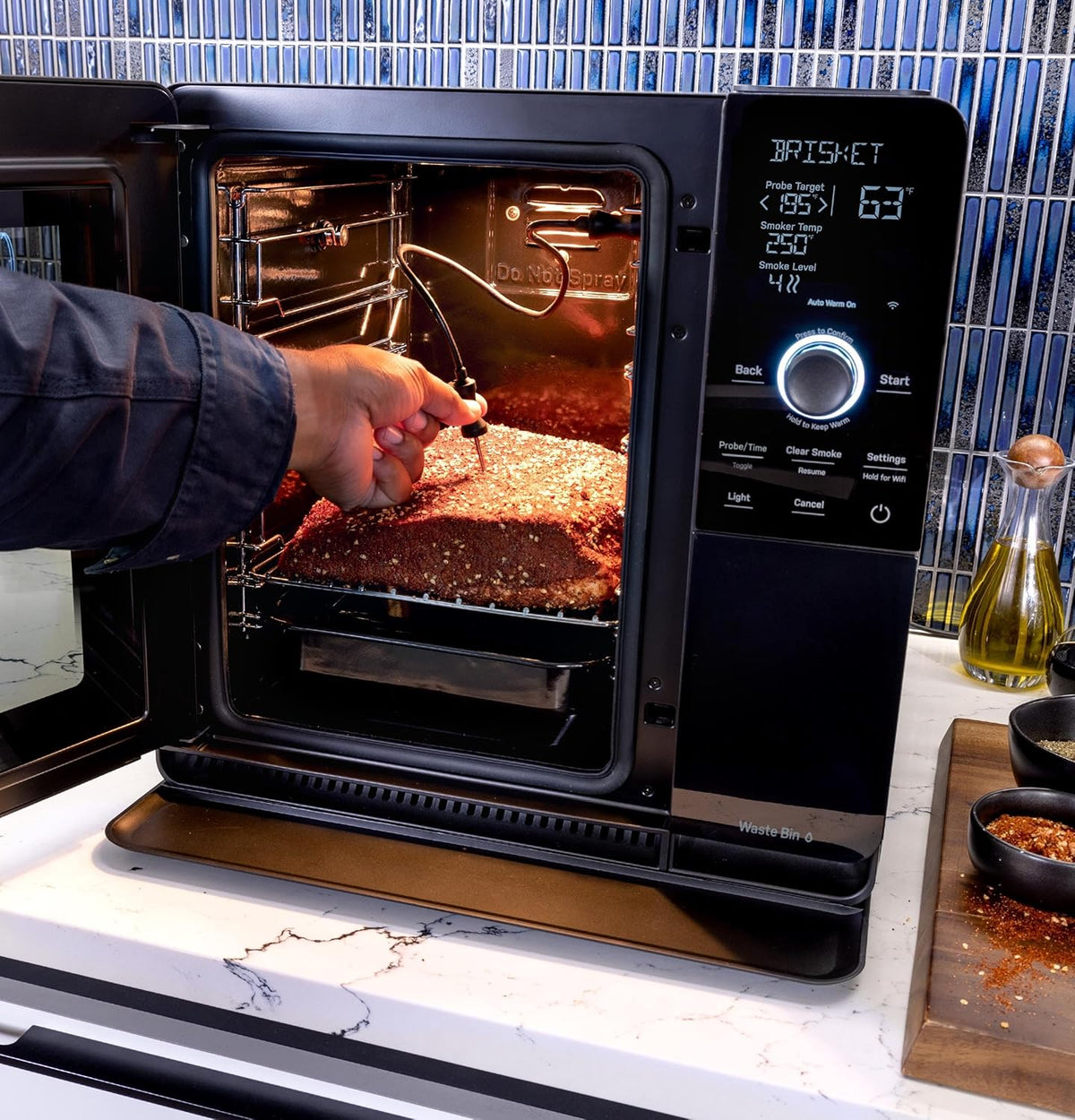 Smart Indoor Pellet Smoker. with Active Smoke Filtration. 5 Smoke Control Settings. WiFi Connected. Electric. Countertop BBQ Appliance. Black