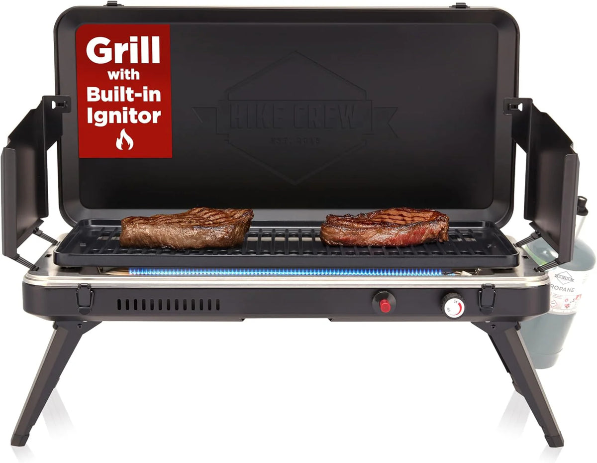 Gas camping barbecue grill | 13.000 watts | Portable liquefied gas burner | Foldable legs and feet | Integrated igniter and built-in regulator (with stainless steel drip tray) | Windproof panel and built-in handle