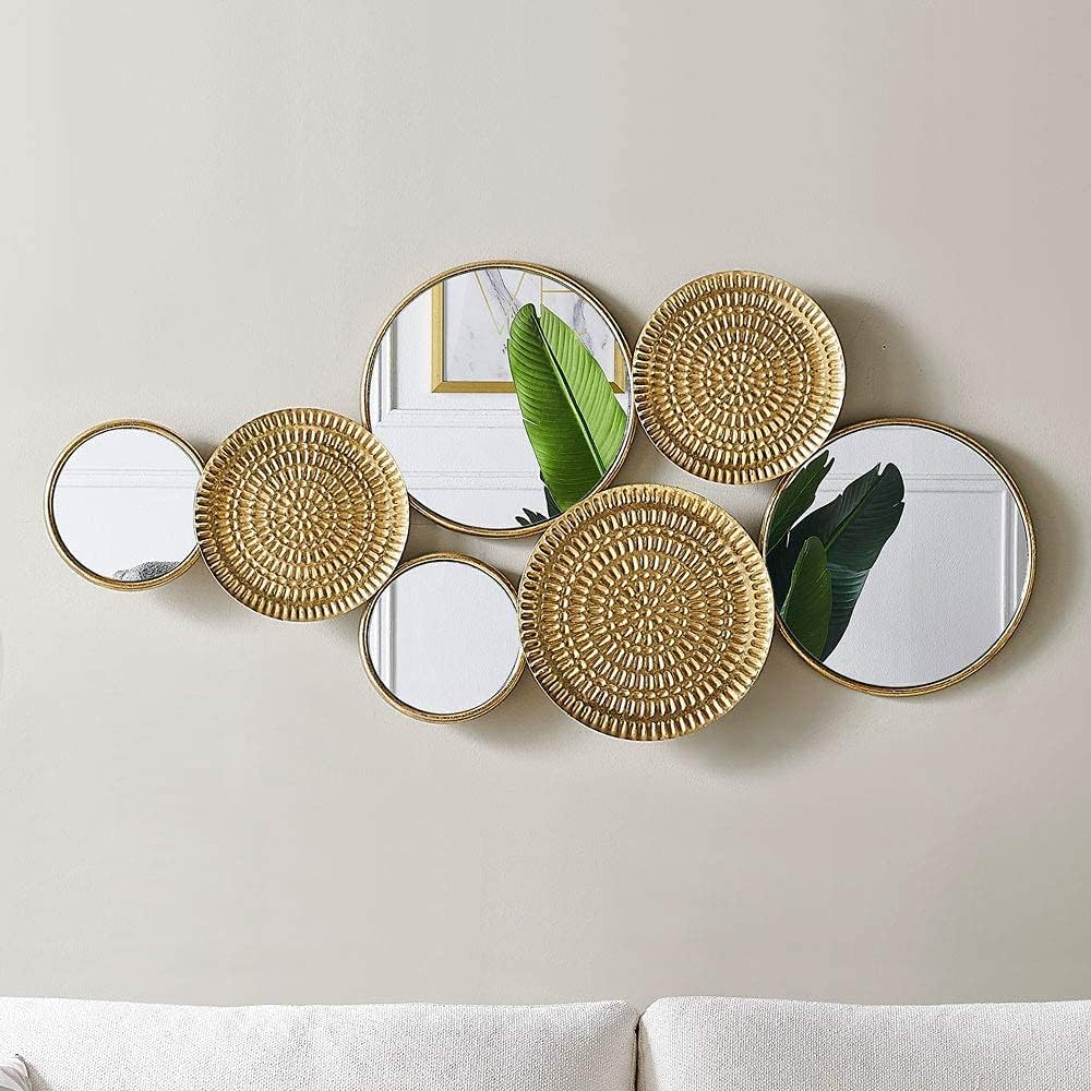Home decoration metal wall ornaments. a mirror with multiple circular lenses. large modern wall art sculptures for decoration. suitable for living rooms. offices. and bedrooms. Dimensions: 45.3 x 1.9 x 21.6 inches. Made of gold material.