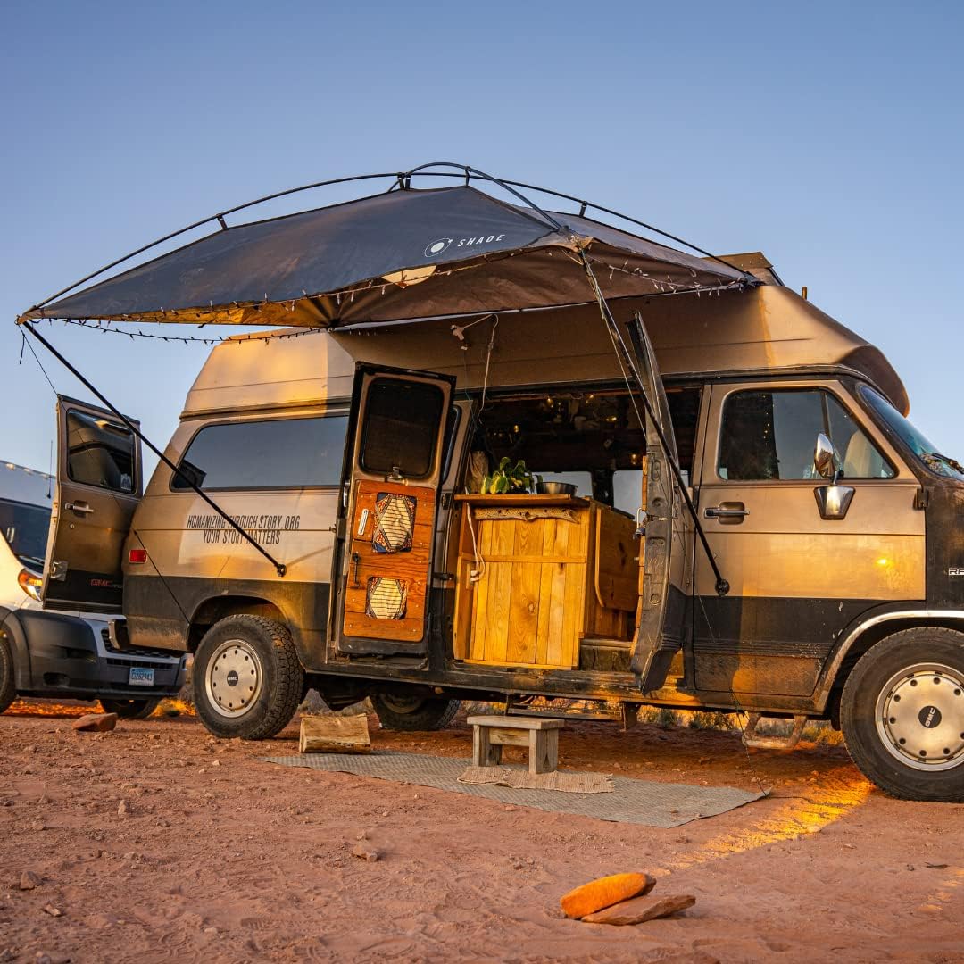Sunshade portable roof tent. with dimensions of 9 feet by 7 feet. has a large shading area. is lightweight and durable. and is suitable for vehicles such as trucks. SUVs. vans. and camper vans (dark blue)