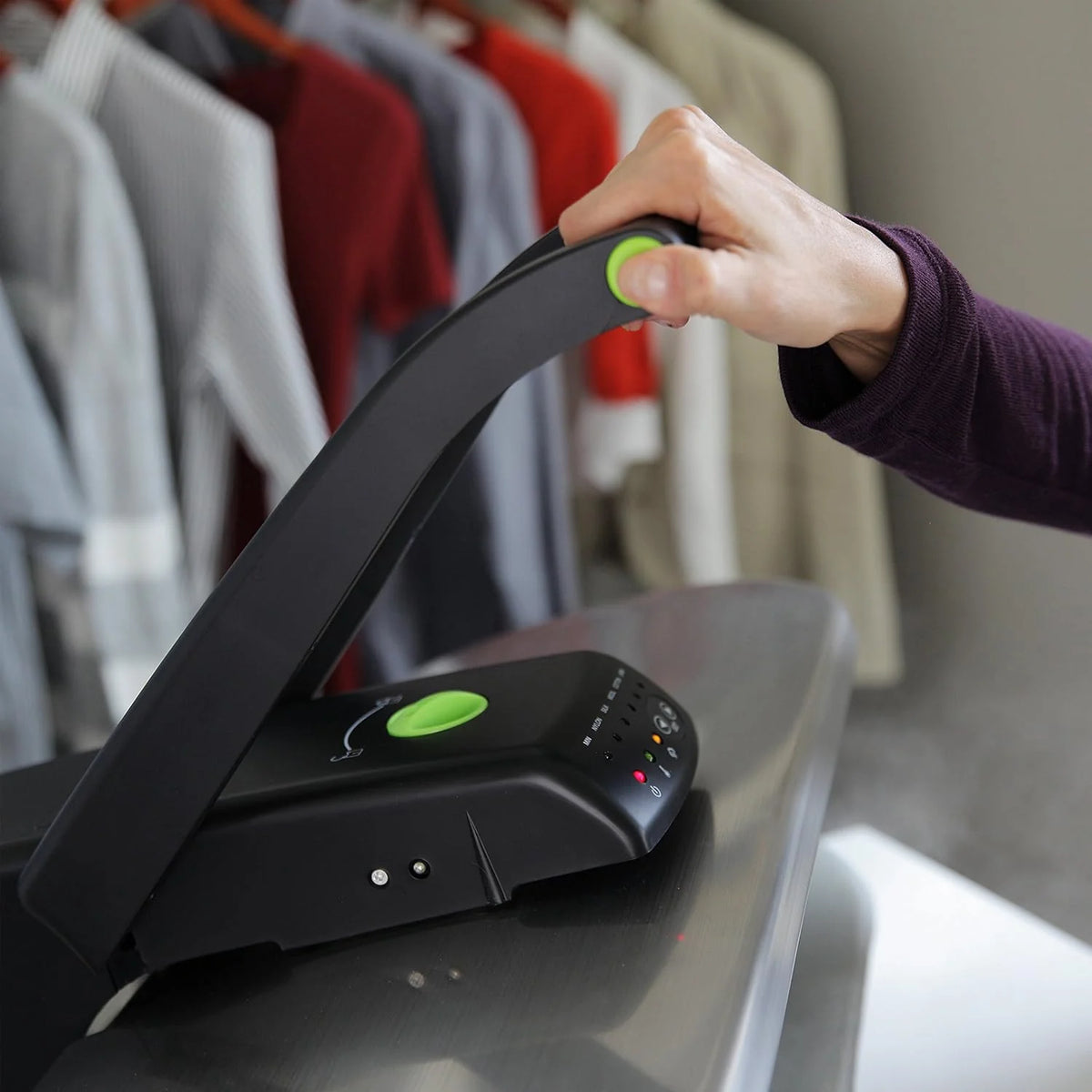 Digital steam press. featuring multiple fabric setting functions and steam impact function. made of stainless steel / black.