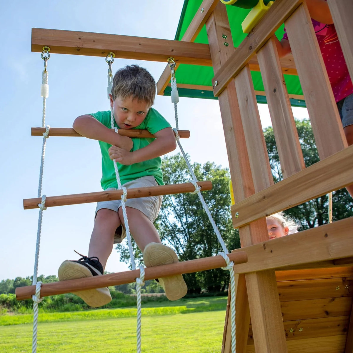 Cedar Wood Swing Set with Wave Slide. Play Deck. Double Rock Wall. Rope Ladder. Web Swing. Belt Swings. Toy Telescope. Steering Wheel. Sandbox Area. Outdoor Playset