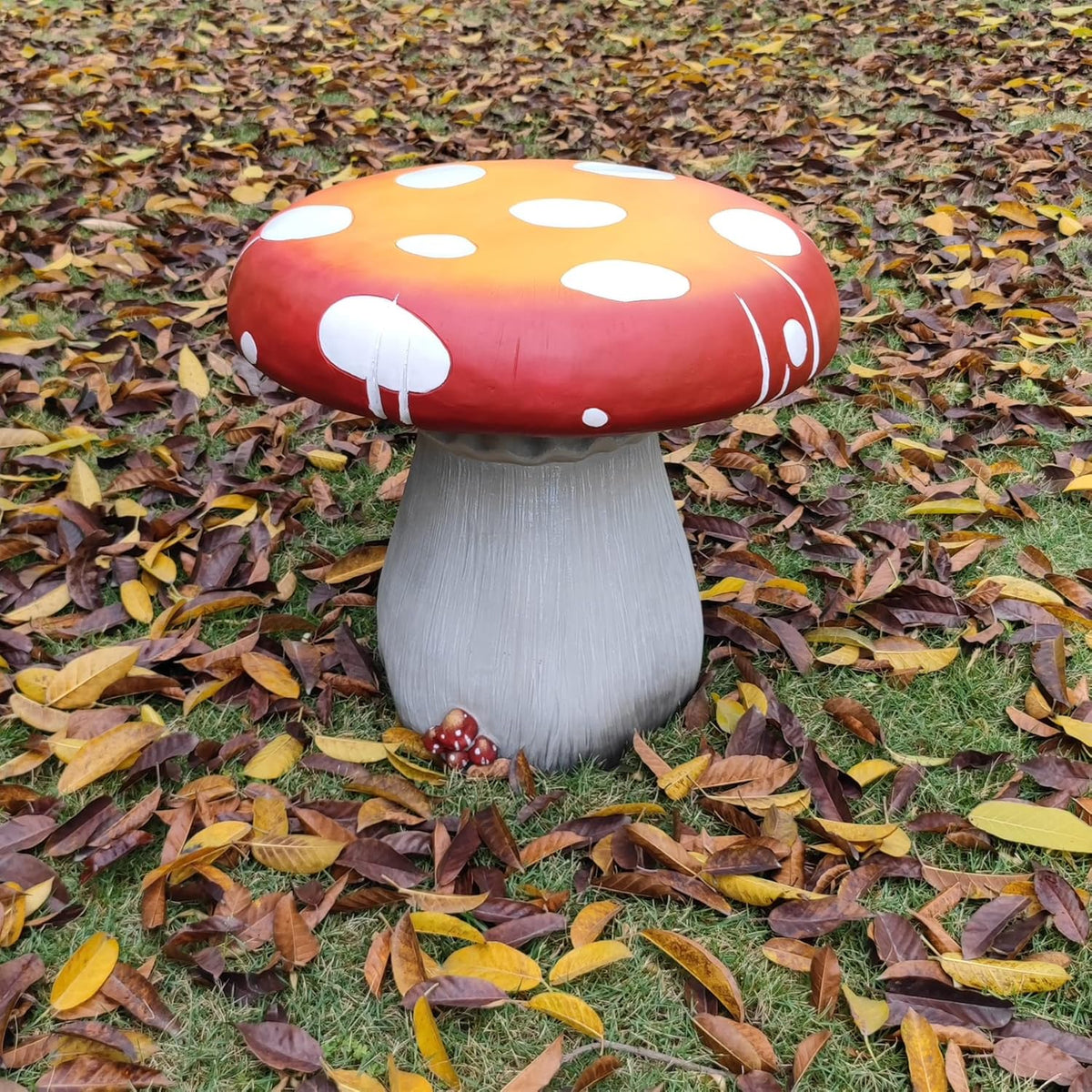 Resin statue 20.8 feet tall. indoor and outdoor dining table. large-sized sculpture. garden lawn. pool decoration. exterior courtyard of buildings. round dining table. chair decoration. red mushrooms
