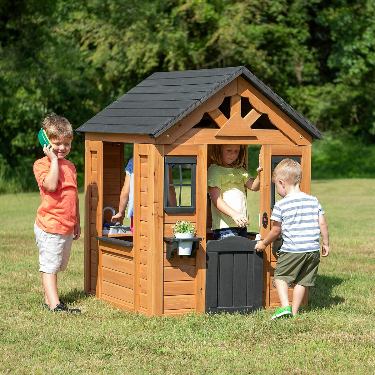 Children's playhouse cabin. equipped with a game kitchen. snack bar. half-door. toy phone. windows. flower pot stand and an operable doorbell. suitable for creative outdoor games.