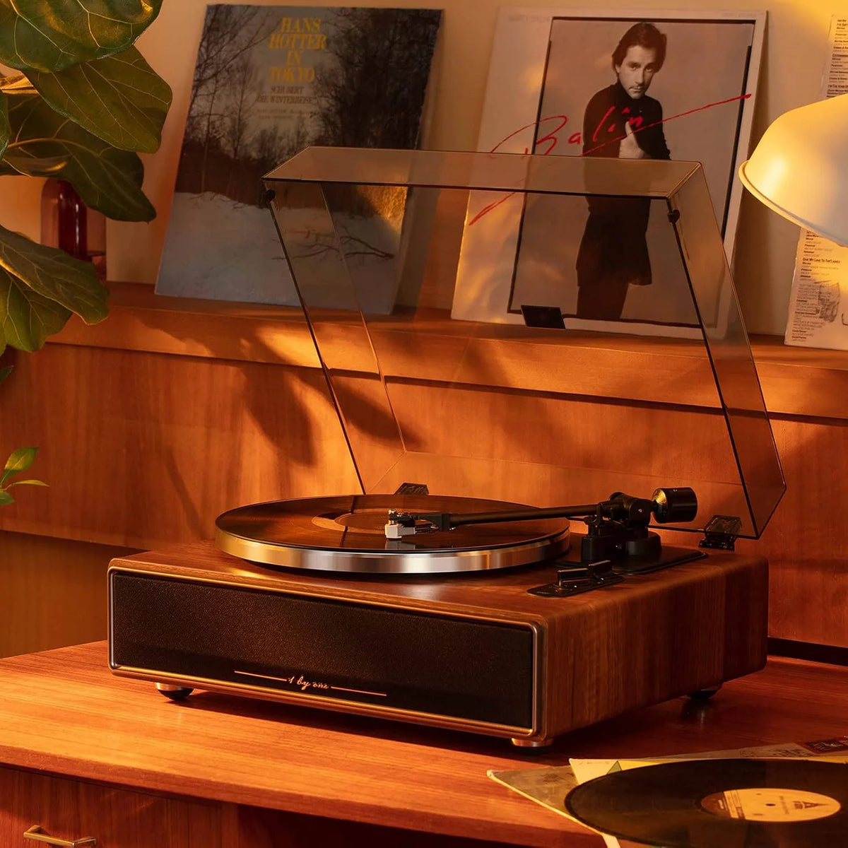 High Fidelity Belt Drive Turntable with Built-in Speakers. Vinyl Record Player with Magnetic Cartridge. Bluetooth Playback and Aux-in Functionality. Auto Off