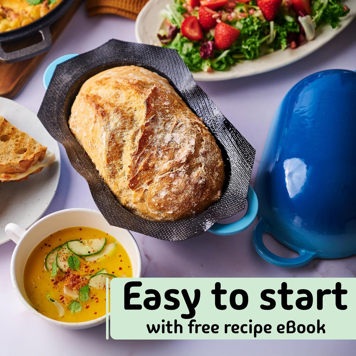 Super Simple Craft Bread Set. Cast iron Dutch oven [compact 2-bowl capacity] and perforated non-stick silicone liner.
