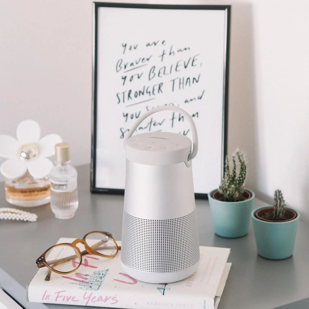 Bluetooth speaker. portable speaker with microphone. wireless and waterproof. 360-degree omnidirectional sound output. long-lasting battery and handle. silver appearance