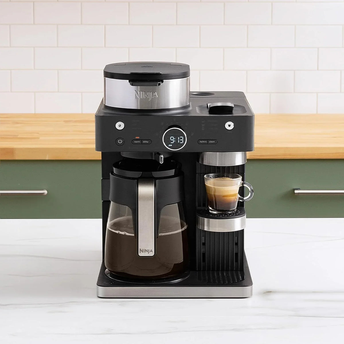 Italian espresso machine and coffee-making system. featuring three espresso brewing modes. supporting single-portion coffee and Nespresso capsules. with a built-in frother. capable of making Italian espresso. cappuccino and latte. Black style.