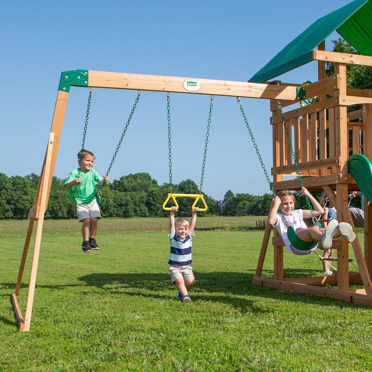 Mount Mckinley Cedar Wood Swing Set with Wave Slide. Play Deck. Double Rock Wall. Rope Ladder. Web Swing. Belt Swings. Toy Telescope. Steering Wheel. Sandbox Area. Outdoor Playset