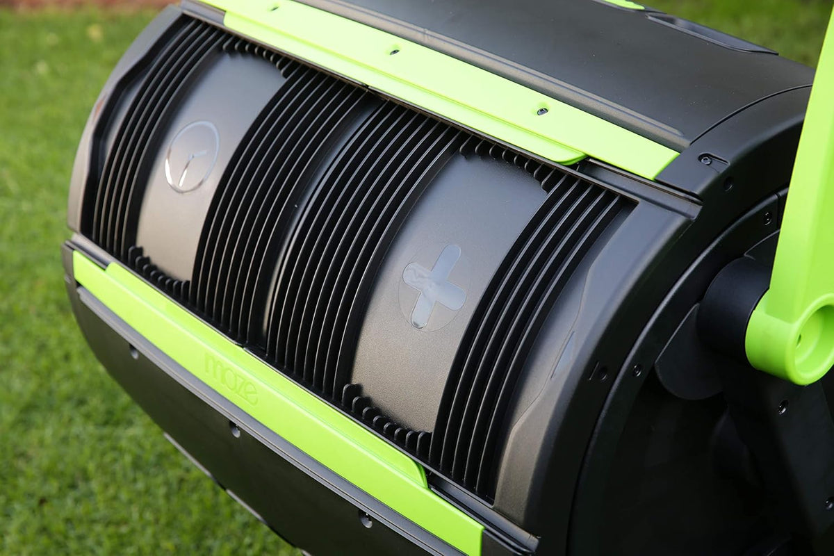 Two 65-gallon two-stage composting drums. equipped with large double doors and an open frame. are also provided along with a maze-style compost cart. a 1.85-gallon kitchen trolley-style compost bin. three rolls of corn bags. and a retractable plant t
