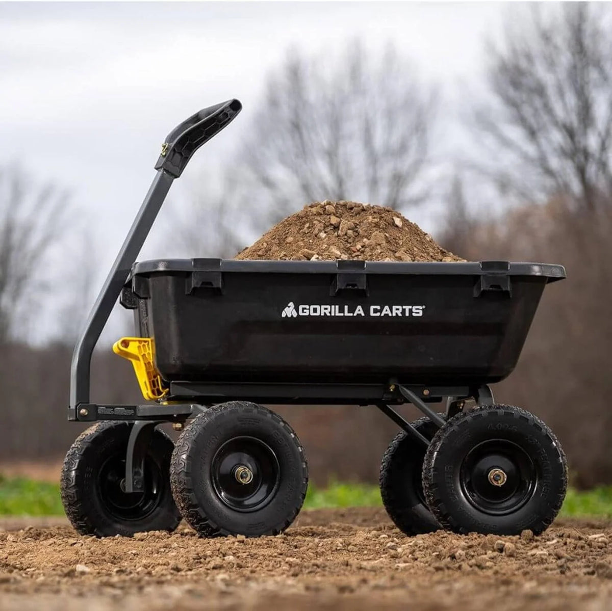 7-Cubic-Foot Poly Dump Garden Cart with No-Flat Tires. 1.200-Lb. Capacity. Black