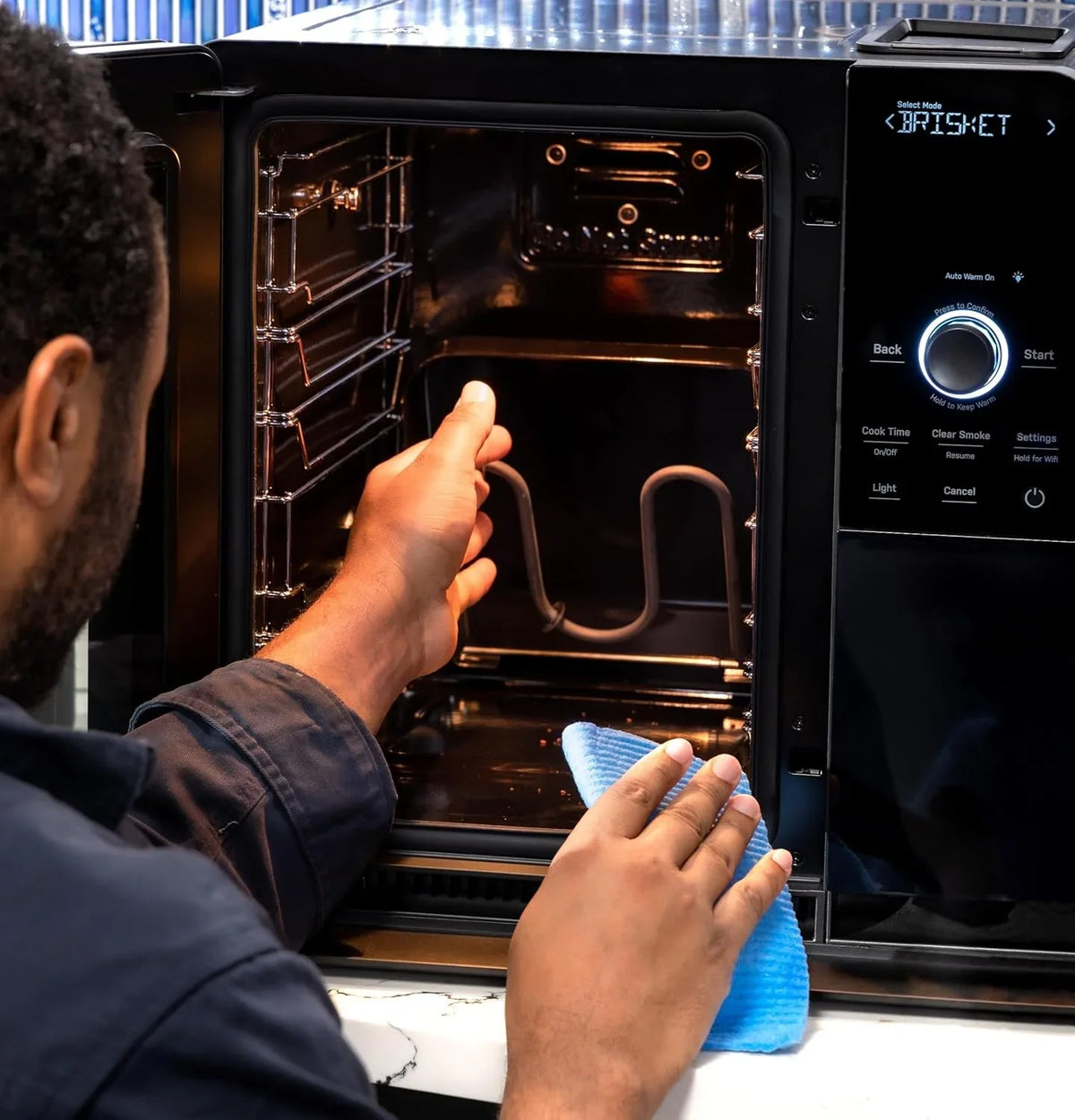 Smart Indoor Pellet Smoker. with Active Smoke Filtration. 5 Smoke Control Settings. WiFi Connected. Electric. Countertop BBQ Appliance. Black