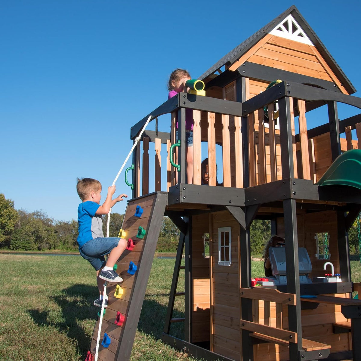 Gorge Creek Pure Pine Swing Set. Playhouse with Barbecue Grill. Plastic Utensils. Picnic Area. Steering Wheel. Double-Padded Swing. Rock Climbing Wall. Balcony. Terrace. Mesh Swing (Green Slide)