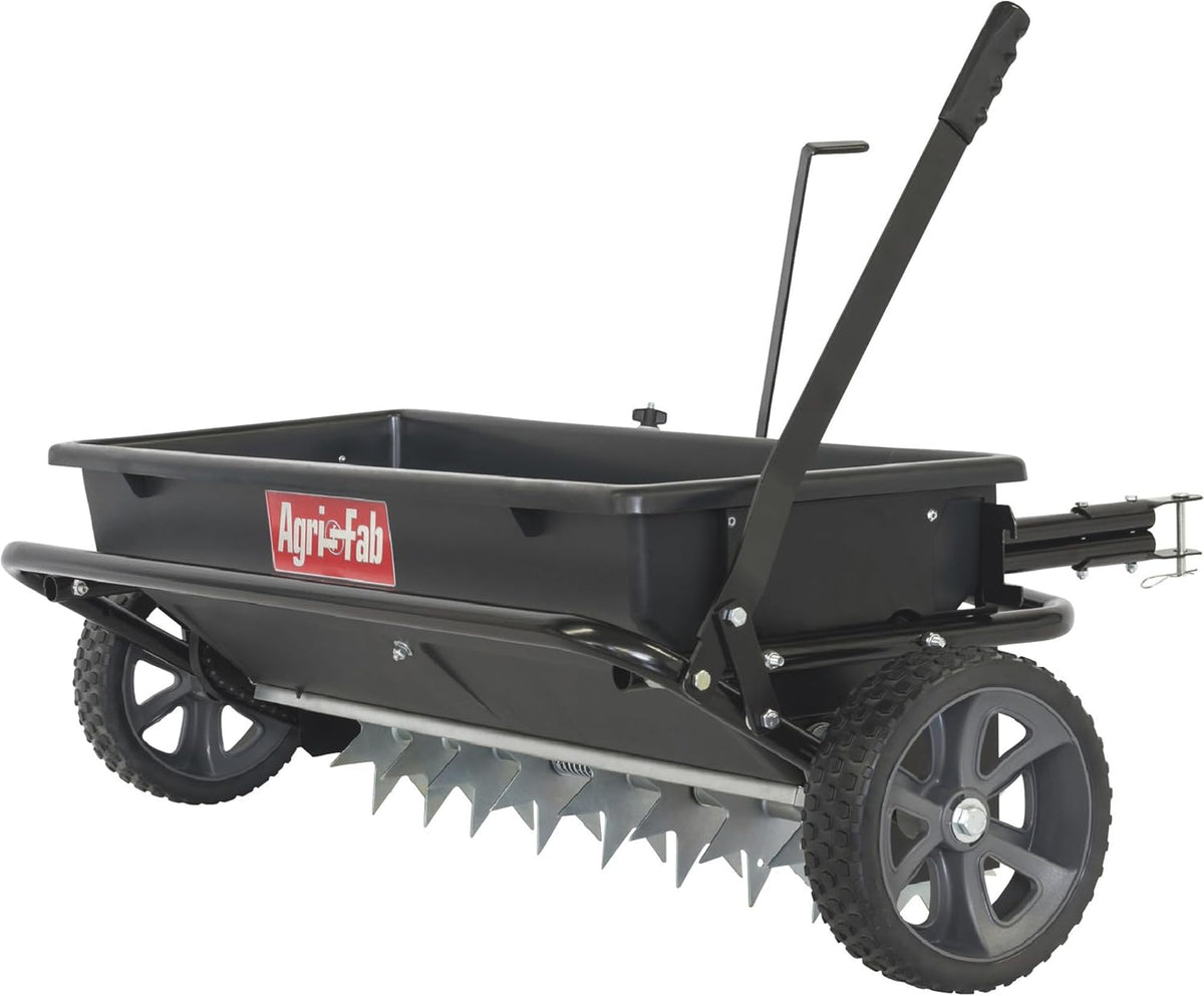 100-pound traction type seeder/seeder/sprayer. black version